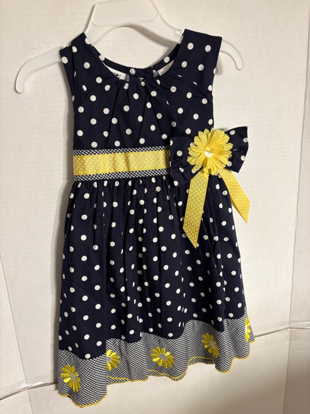 Blueberi Boulevard Navy Polka Dot Dress with Yellow Floral Bow